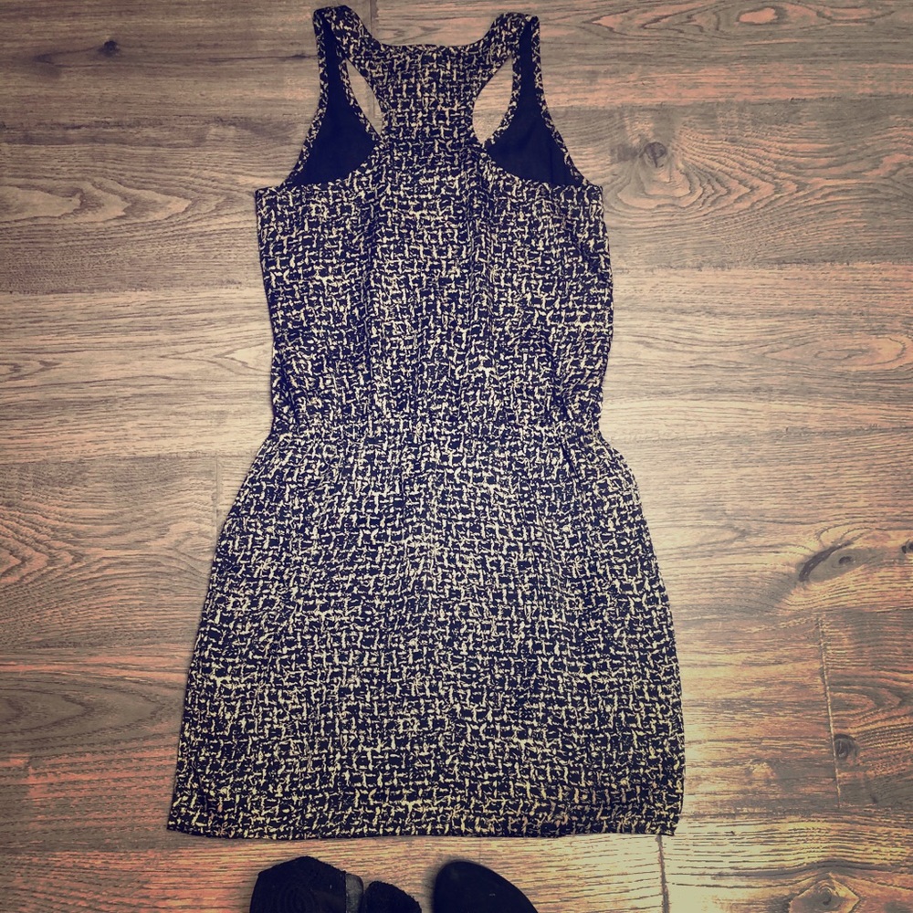 Black and gold sleeveless dress
